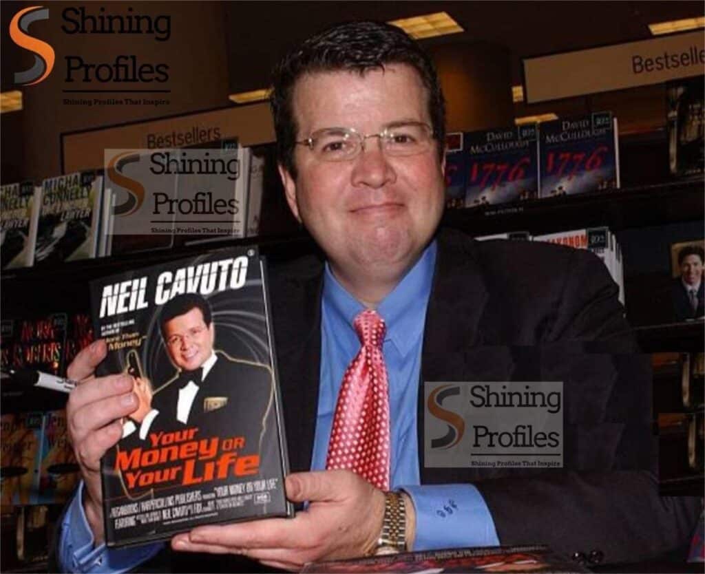 Neil Cavuto with his book